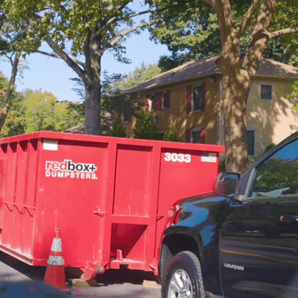 a demolition dumpster rental at a job site