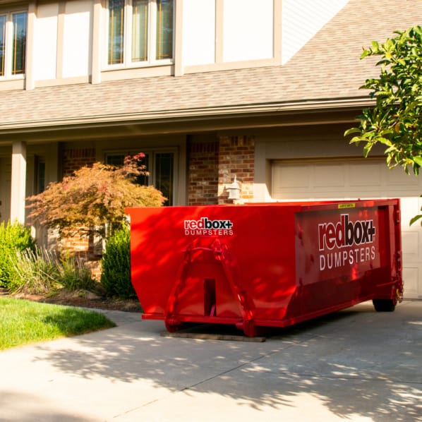 redbox+ mini residential dumpster in front of Baton Rouge home in Inniswold Area