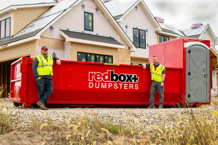 redbox+ Dumpsters of Baton Rouge dumpster rental and employees at a local Baton Rouge job site