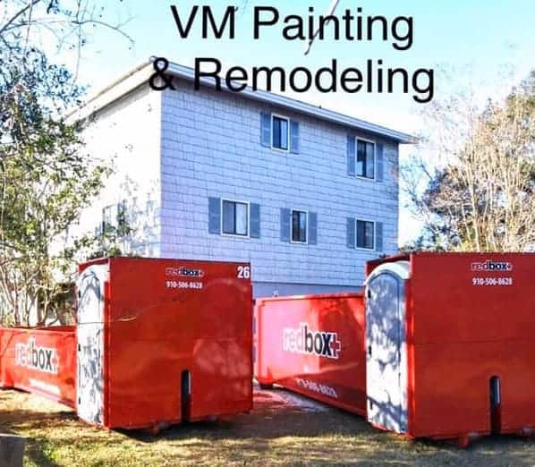 VM Painting & remodeling working on a home with a redbox+ Dumpster of Cape Fear rental