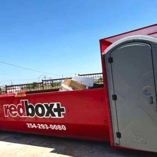 redbox+ Dumpsters of Central Texas elite dumpster rental at jobsite