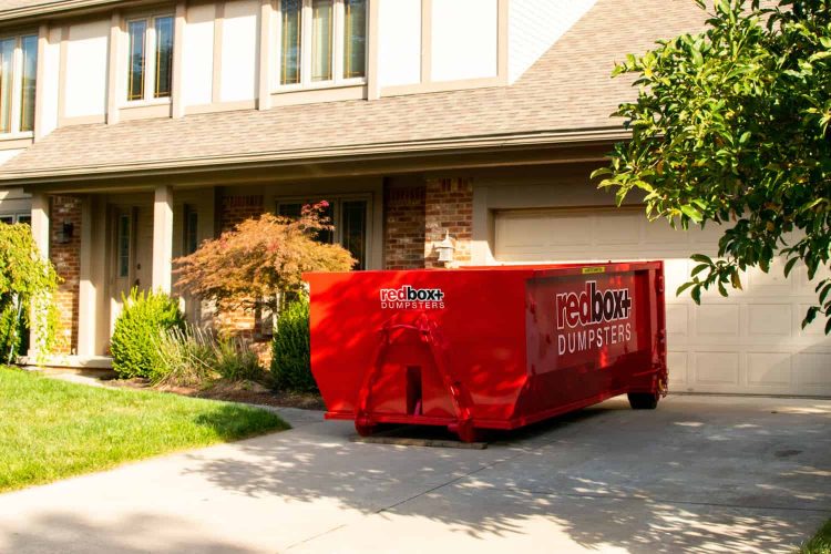 redbox+ Dumpsters of Denver South Metro residential mini 10-yard dumpster rental at a job site in Parker, CO