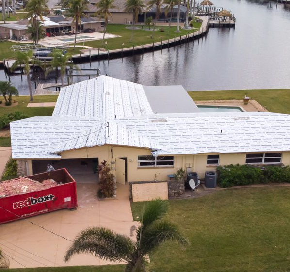 redbox+ dumpster aerial view in front of house
