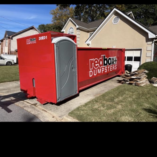 residential dumpster rental with a portable toilet