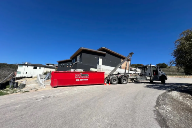 redbox+ roll-off dumpster at a new home construction site