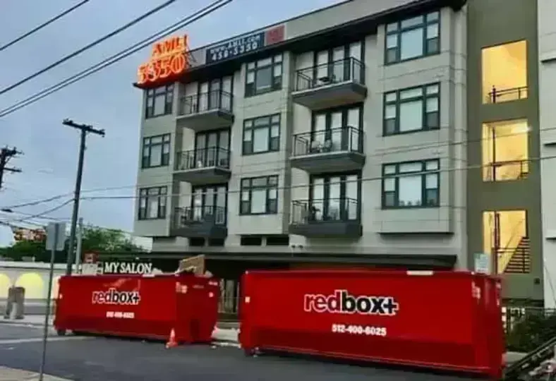 redbox+ dumpsters at an apartment building project