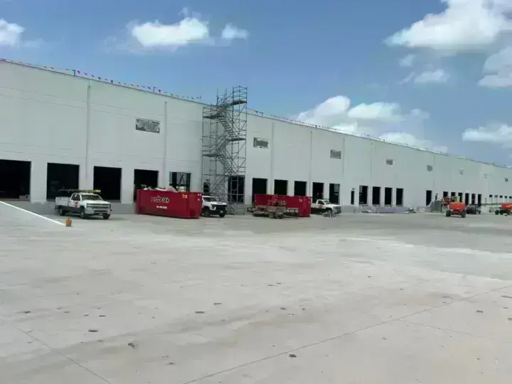 redbox+ dumpsters at a commercial warehouse site