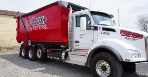 dumpster delivery truck