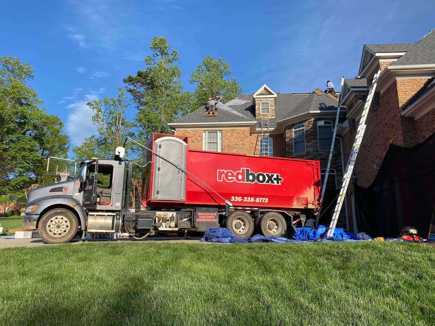 a roofing dumpster rental on site