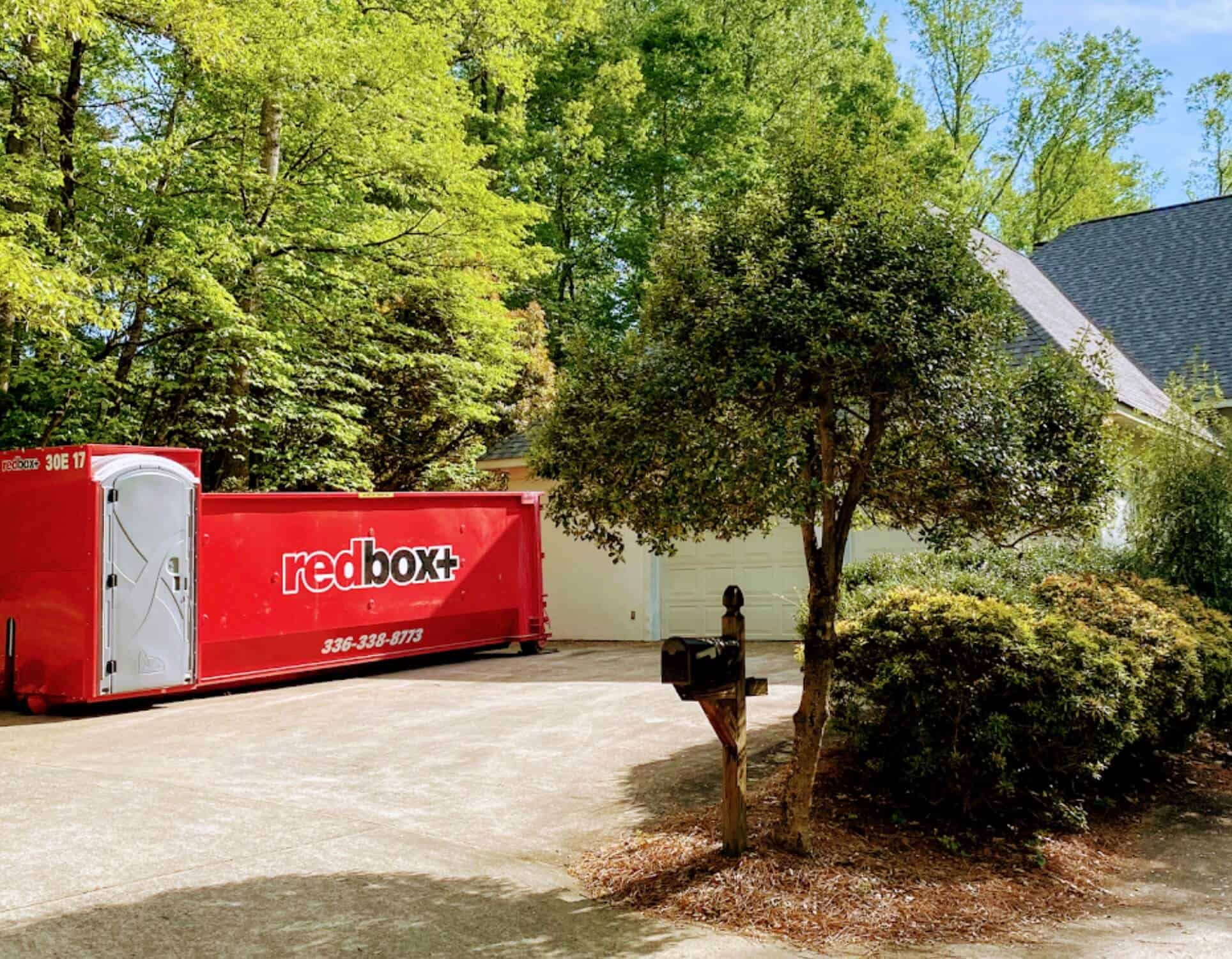 a dumpster in a backyard