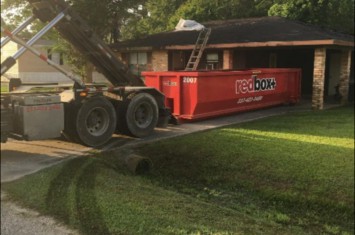redbox+ Dumpsters of Lafayette standard dumpster at residential site