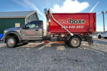 a 10-yard dumpster rental is being delivered.