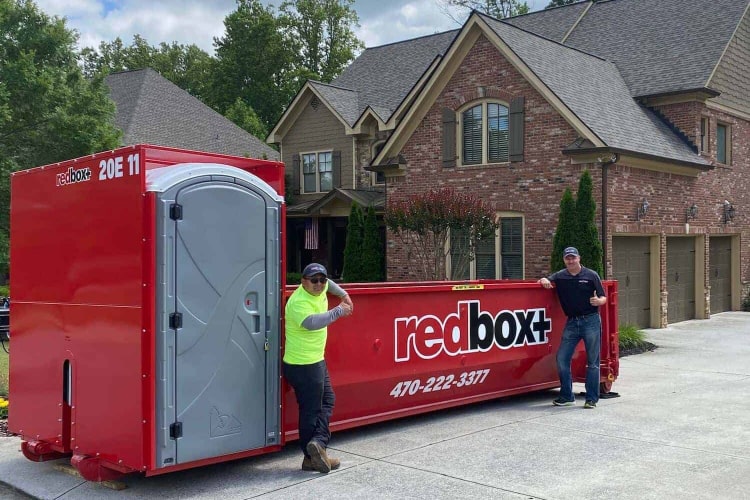 redbox+ Dumpsters of Northeast Atlanta team by a 20-yard Elite dumpster rental