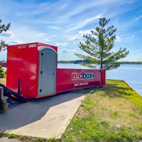 elite dumpster by lake