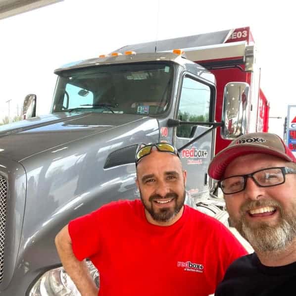 redbox+ dumpsters owners next to truck