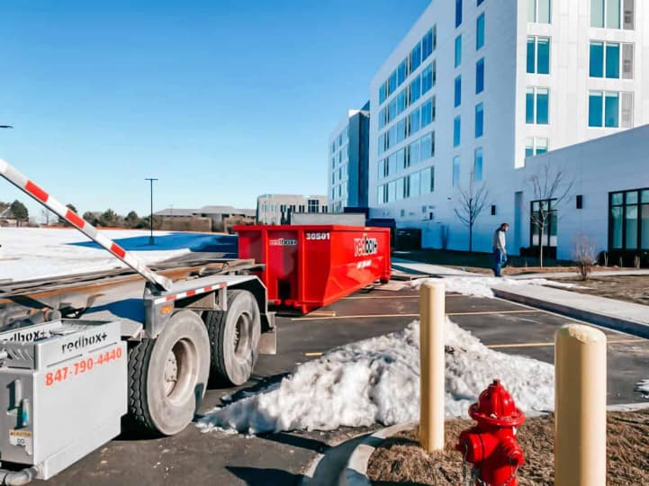 standard dumpster in parking lot