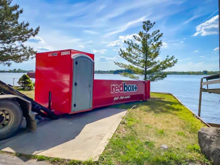 elite dumpster by lake