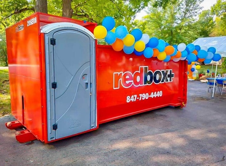 elite dumpster with balloons