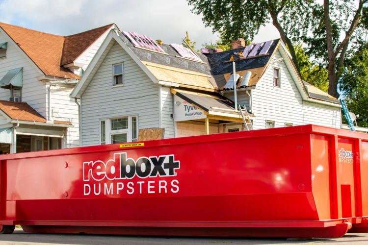 Redbox+ dumpster in a residential driveway in Omaha for a bathroom remodel project