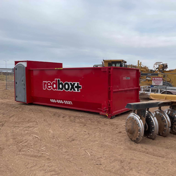commercial dumpster rental with a porta potty
