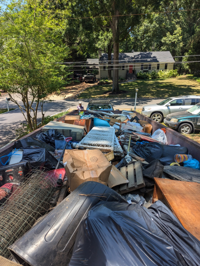 a dumpster rental stuffed to brim