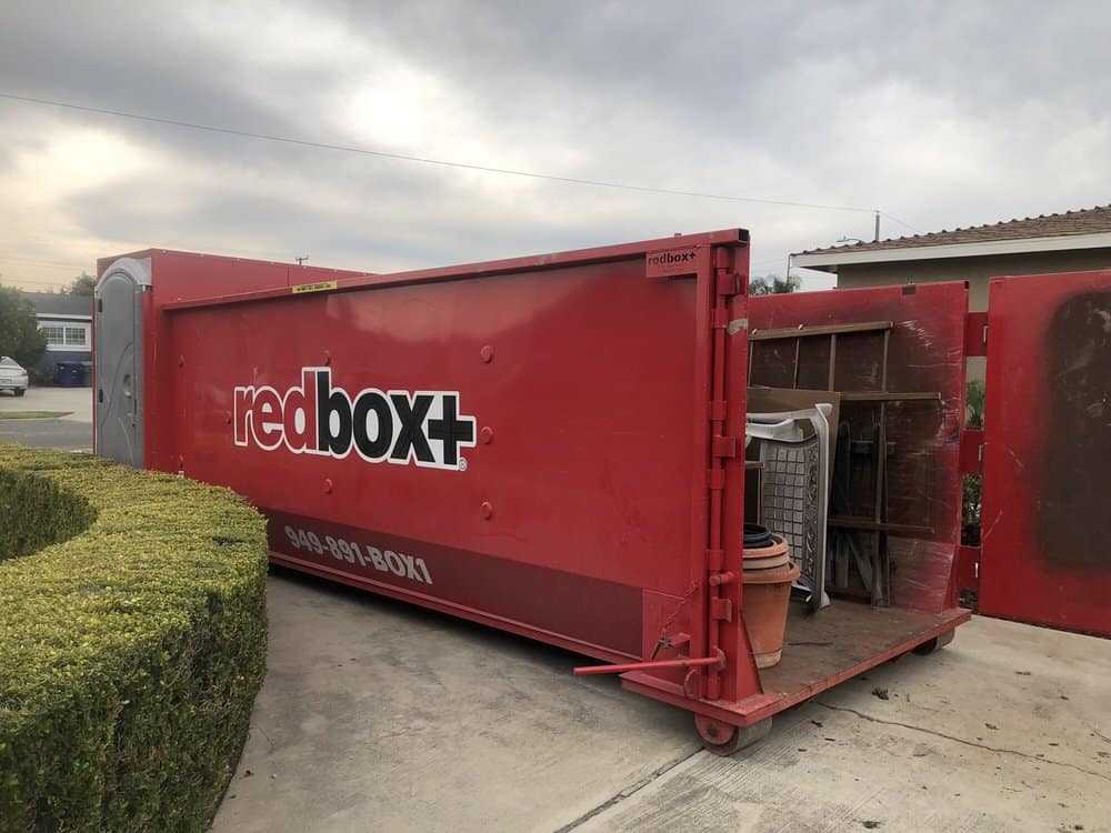 elite dumpster full of waste riverside