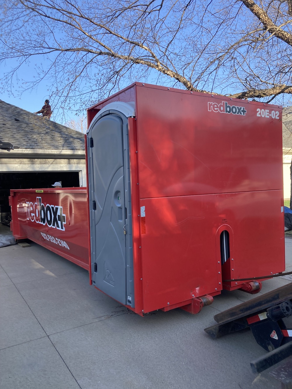 roofing dumpster rental outside of a home in the burnsville area
