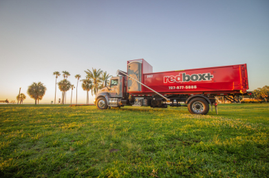 redbox+ dumpster by beach