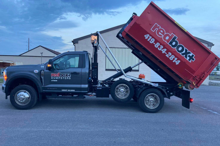 mini dumpster rental on truck in Toledo