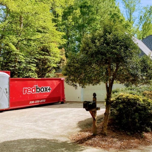 a dumpster in a winston-salem backyard