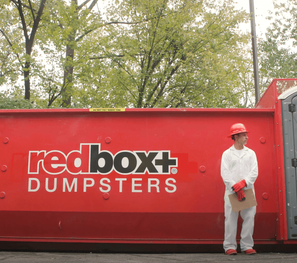 tech outside of a dumpster